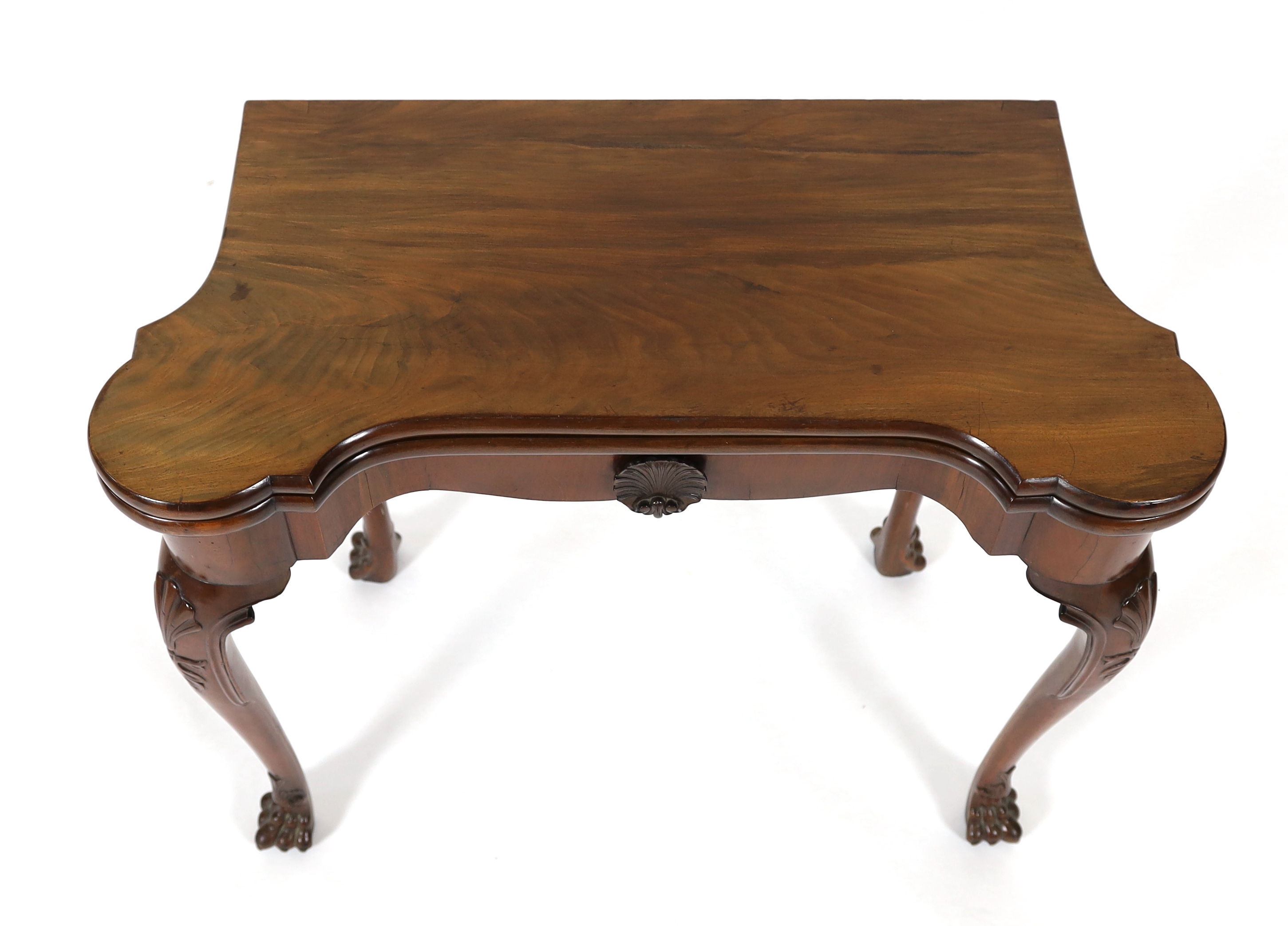 A George II mahogany serpentine folding top tea table, 80cm wide, 40cm deep, 75cm high